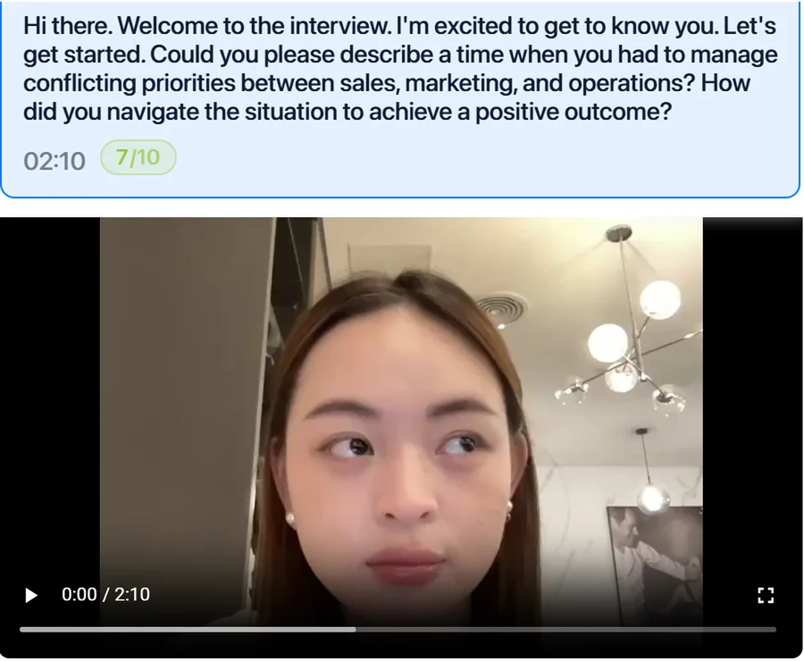 The same report's interview tab: the AI's question, the answer's length and its score out of 10, above the recorded video of the answer.
